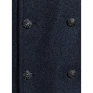 Close-up of navy wool pea coat with anchor-embossed black buttons for men