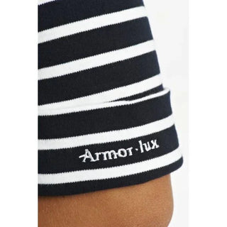Close-up of navy and white striped Armor Lux shirt sleeve with embroidered logo