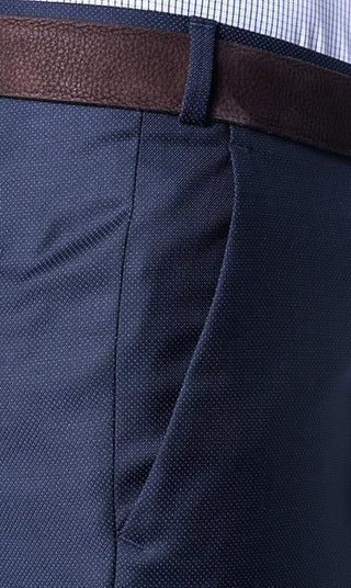 Close-up of navy wool dress pants with brown leather belt and shirt for men