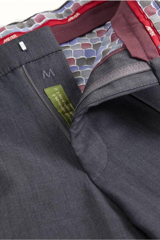 Close-up of grey lightweight wool pants with zipper and patterned inner waistband